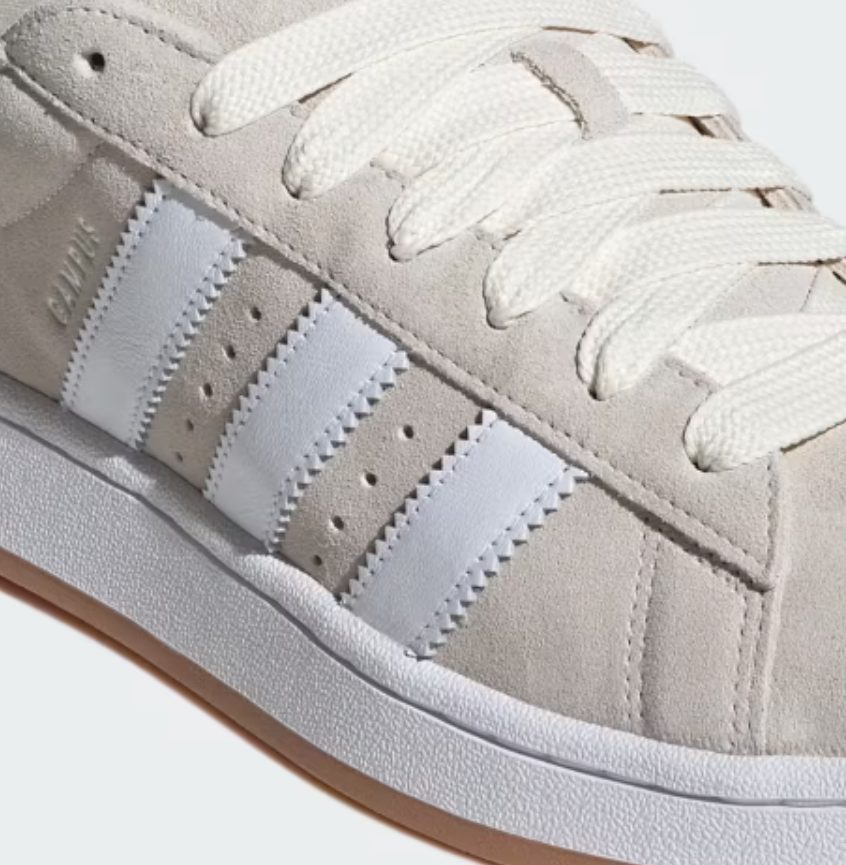 detalle costuras y tres bandas adidas originales